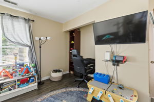 Another view of 3rd bedroom with newer LVP floors and nice closet.