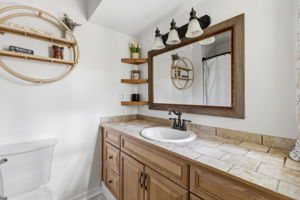 Full bathroom attached to primary bedroom.