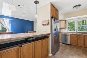 Raised breakfast bar in kitchen makes meal time a breeze!