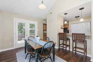 Dining area opens to the living room and kitchen.