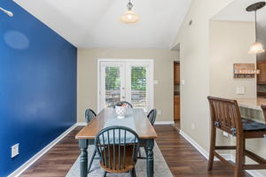 Dining room has access to the rear deck.