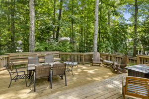 Large two level deck with recently replaced decking boards.