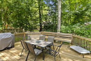 Surrounded by mature growth trees and landscaping makes for a tranquil outdoor experience.