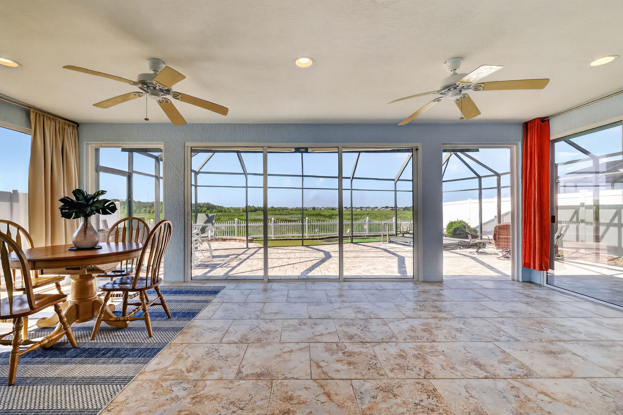 Climate-Controlled Glass-Enclosed Lanai with Water Views!