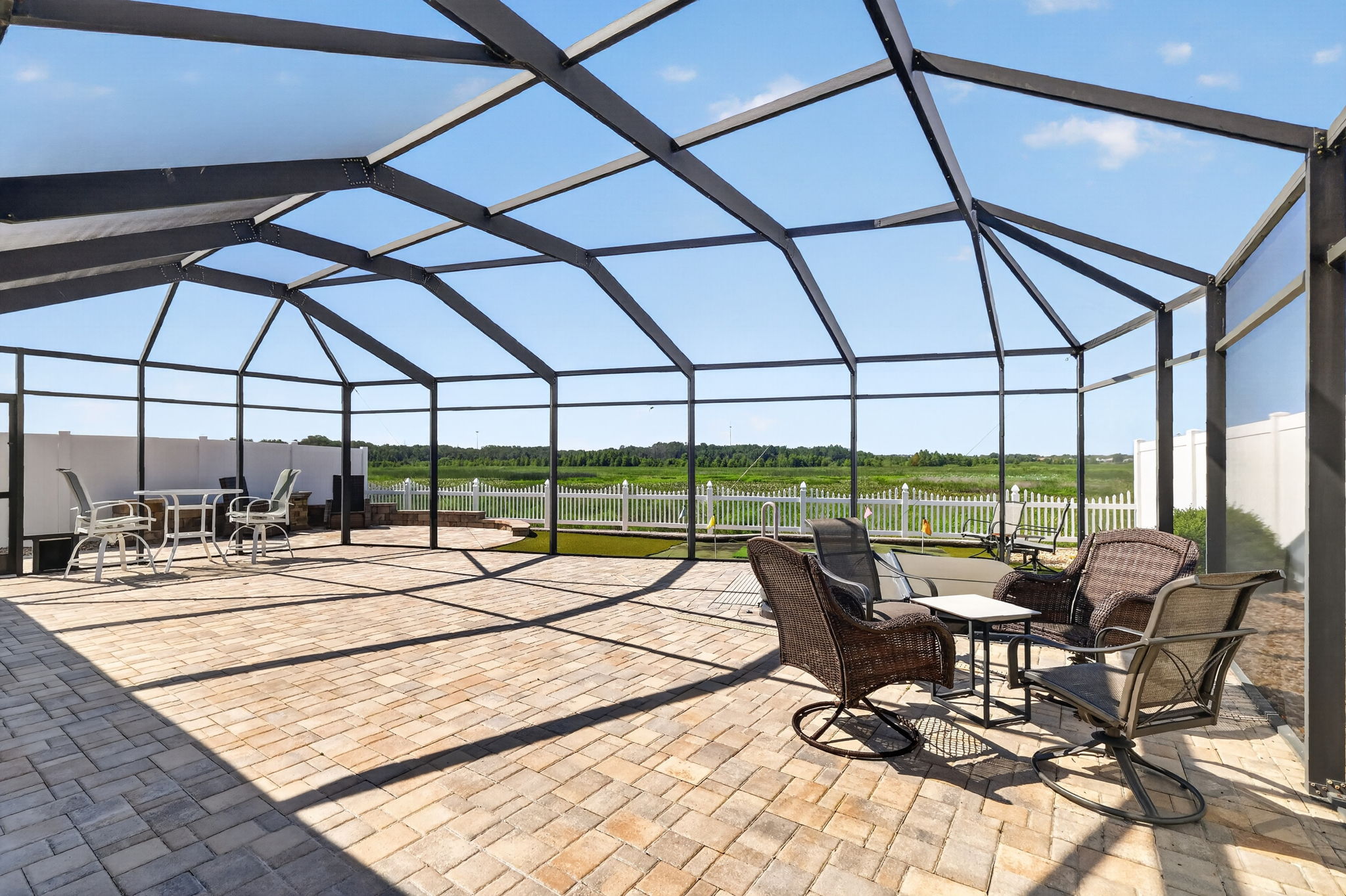 Expansive Paver Birdcage with Water Views!