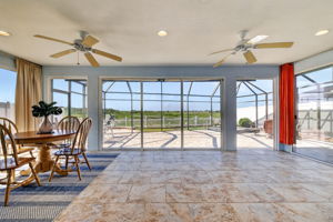 Climate-Controlled Glass-Enclosed Lanai with Water Views!