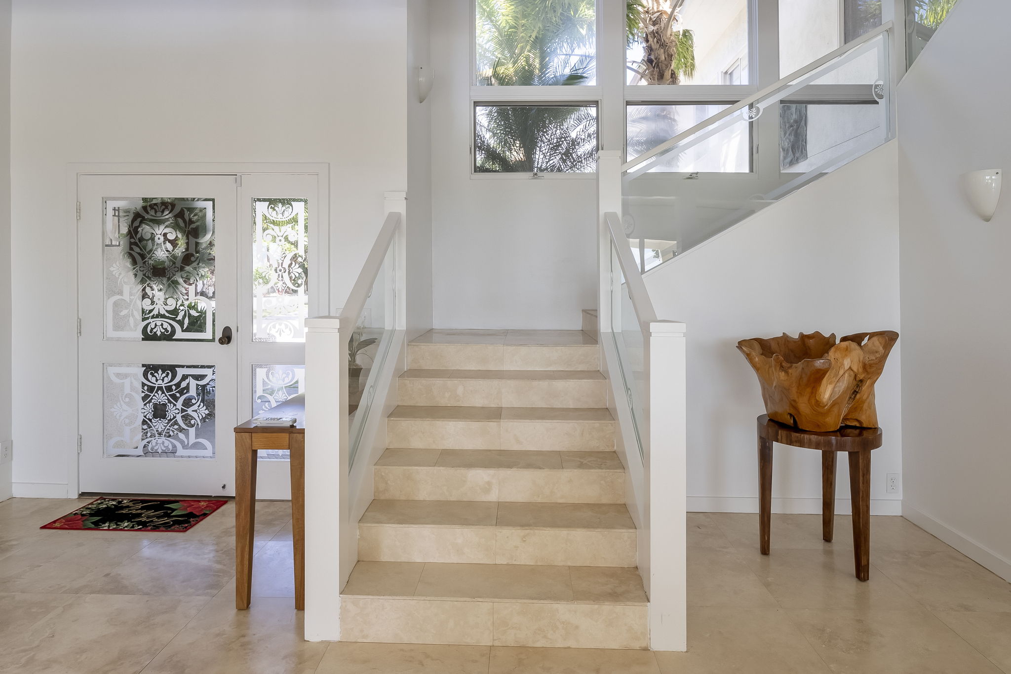 travertine floors continue up the stairs to the 3 XXL Bedrooms