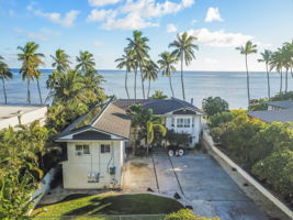 Beautiful Oceanfront with 3-car garage and room for 8 extra cars inside the gate!