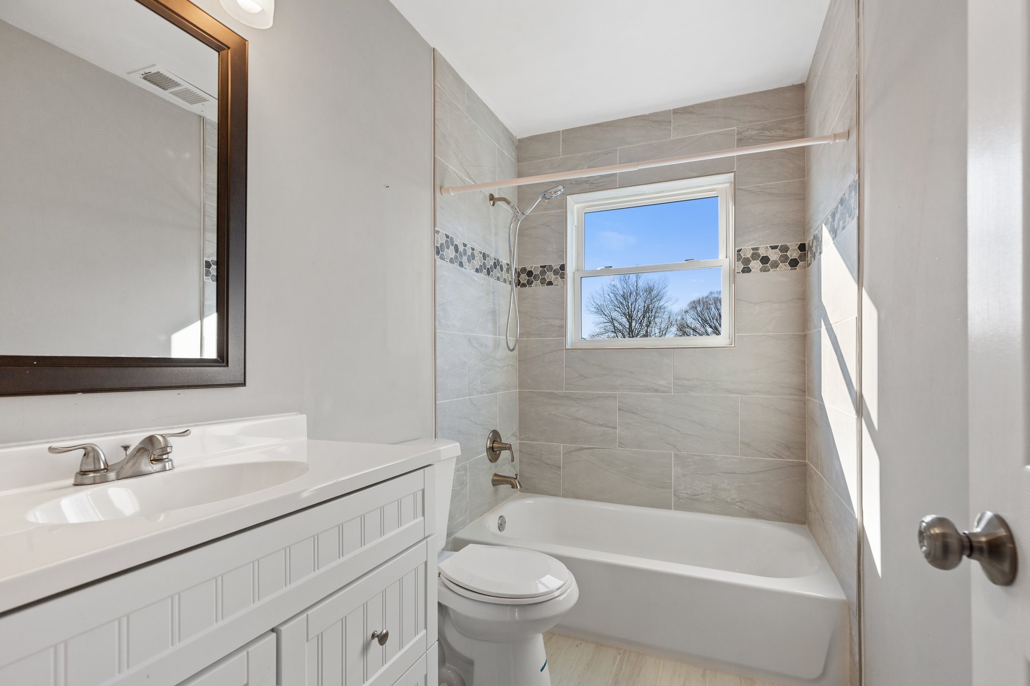 Upstairs Hallway Bathroom - Stylish & Functional.