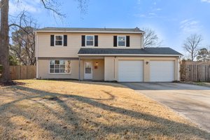 Welcome Home - Oversized Driveway & Garage.