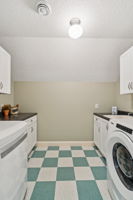 Laundry room above garage