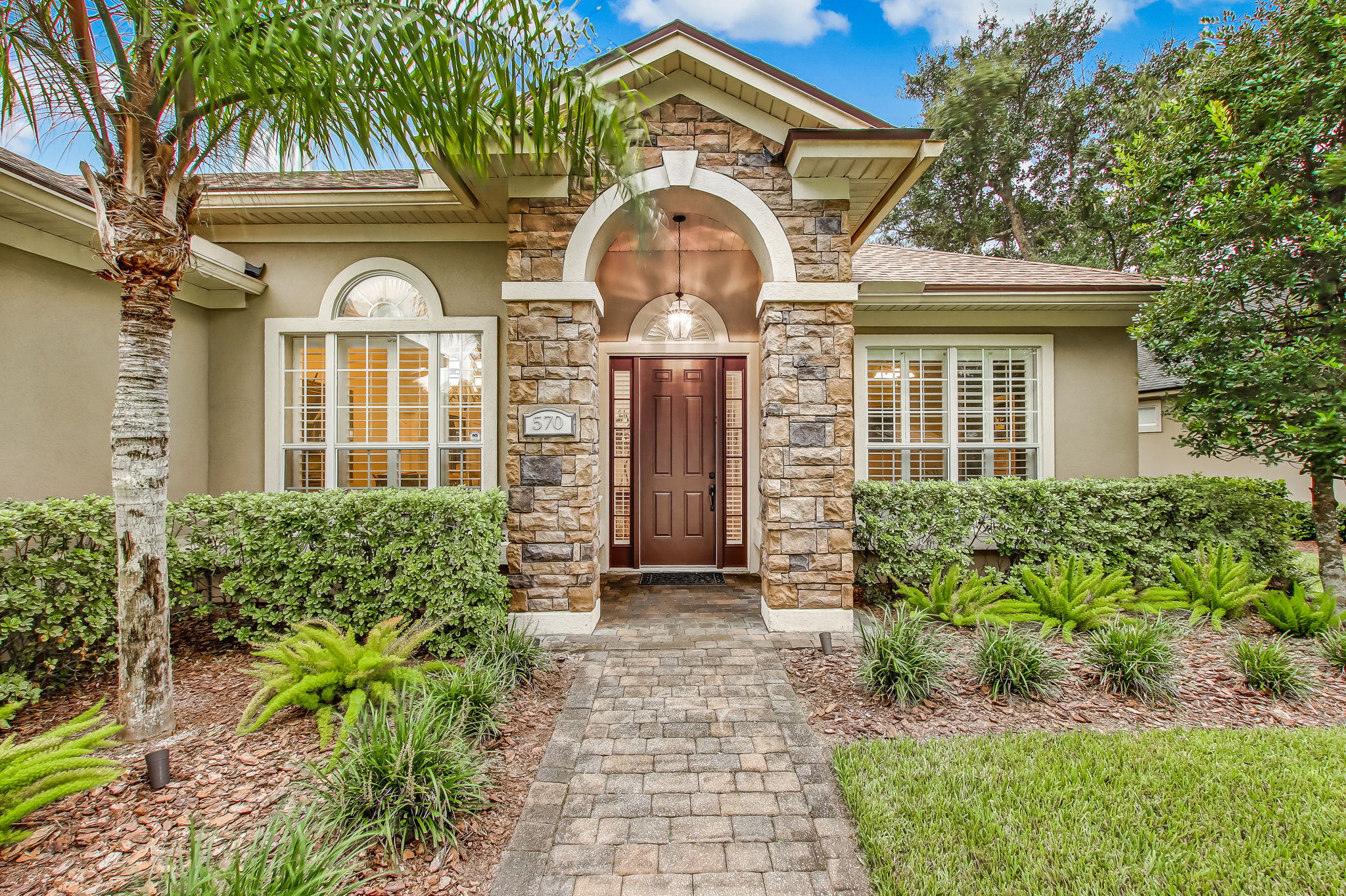 Paver walkways and driveway add beauty and dimension