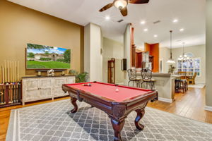 Kitchen opens to spacious family room (or pool room)!