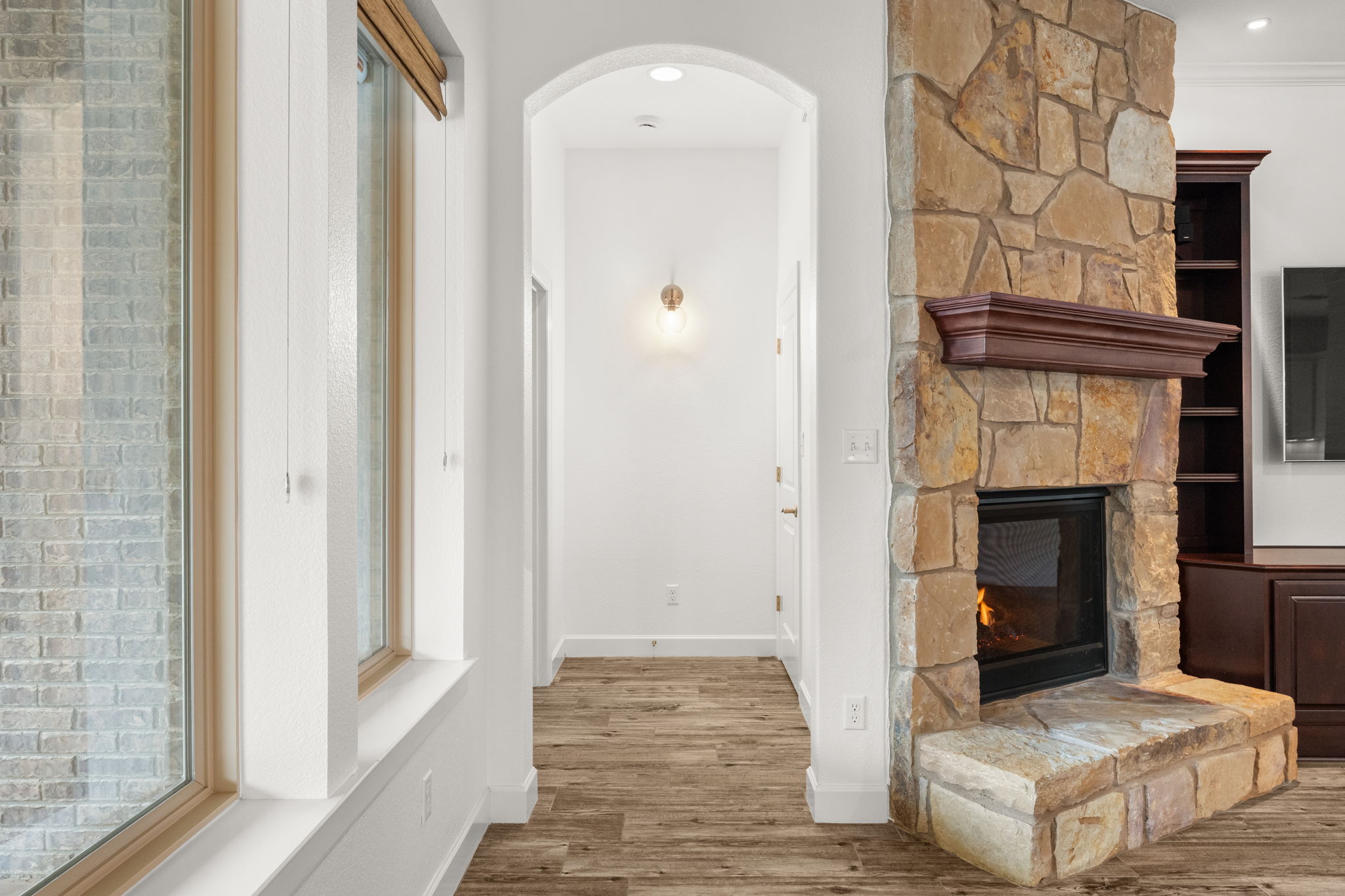 Hallway leading to the primary suite.