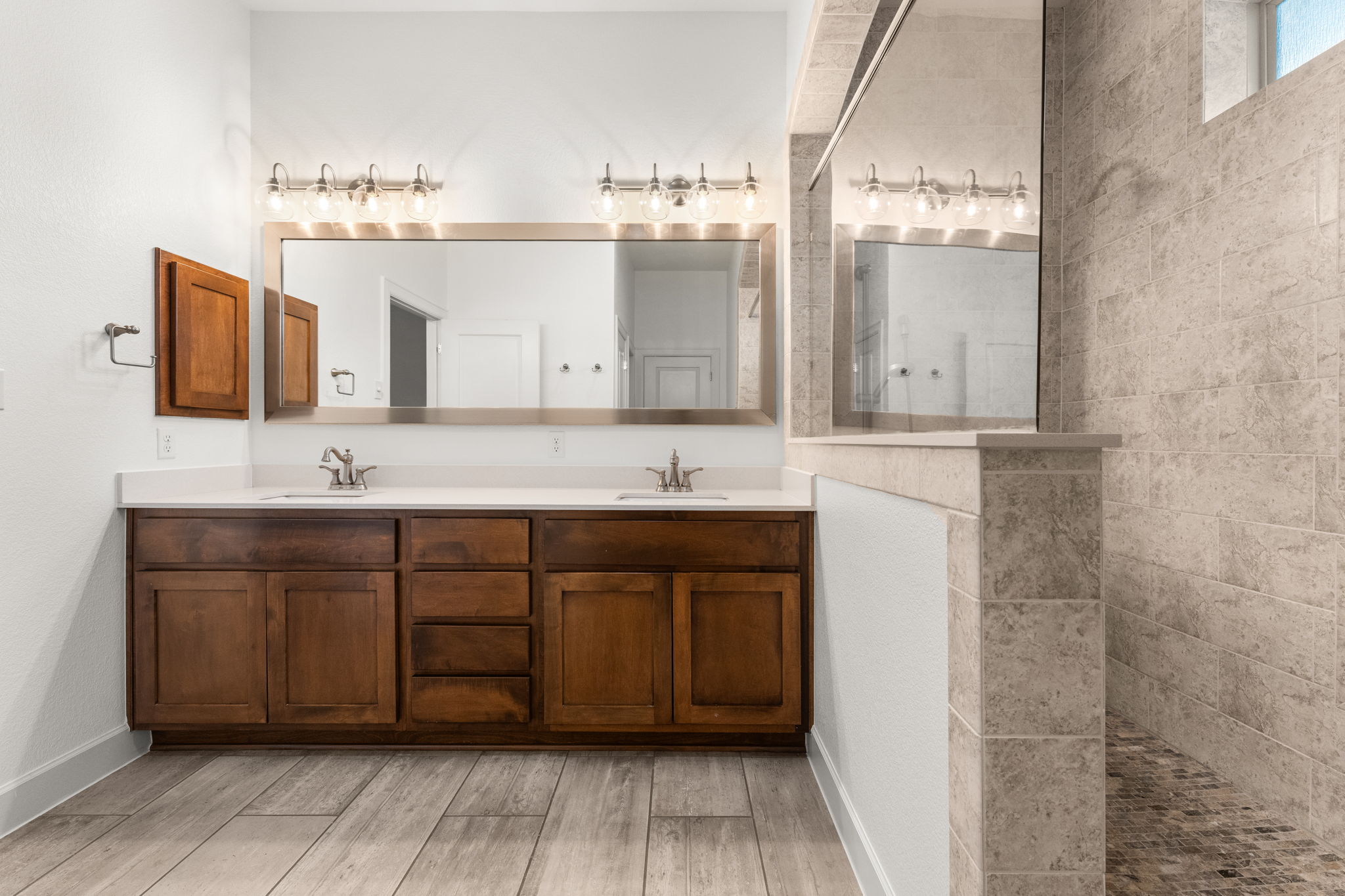 Straight-on view of the primary bathroom.