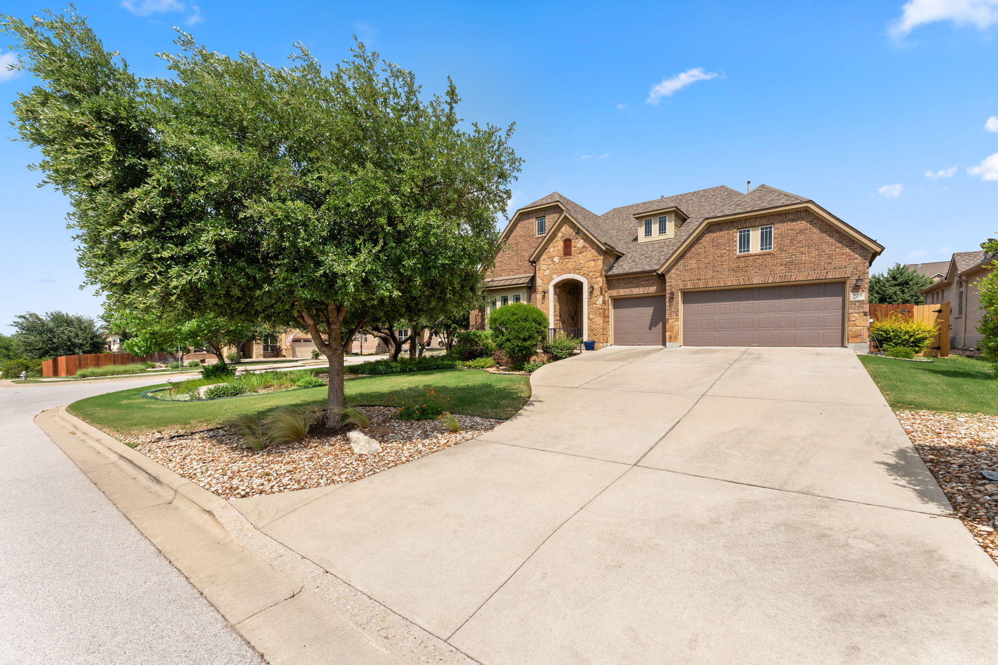 There is a oversized 3-car garage and plenty of driveway parking.