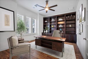 There is a large office with built-ins at the front of the home. Could easily be a 5th bedroom.