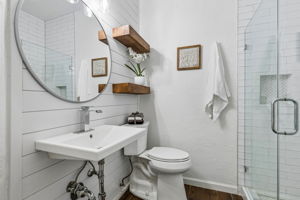 Hall bath is light and fresh