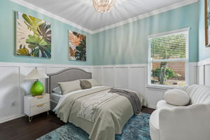 bedroom 2 of 4 with custom wainscotting