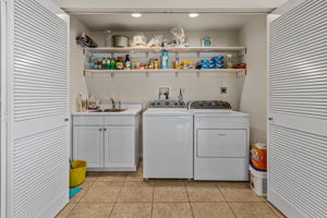 Indoor Laundry w sink and storage
