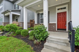 Relax on your covered front porch, perfect for savoring morning coffee or enjoying an evening wine.