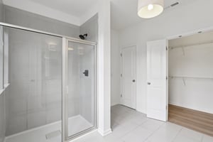 Step into a luxury shower and spacious walk-in closet—comfort and convenience combined.