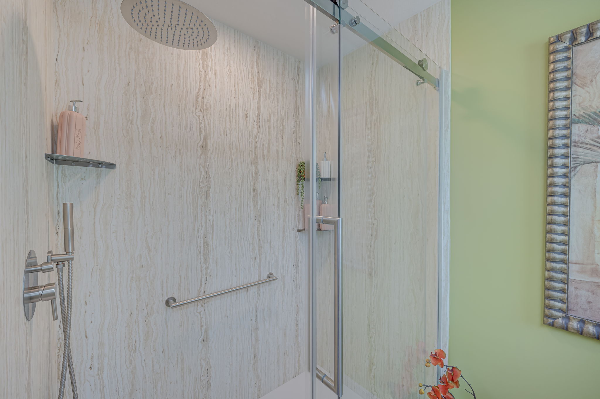 Upgraded primary bathroom featuring a luxurious NEW walk-in shower