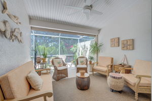 Outside covered lanai space is perfect for entertaining and with an electric roll down storm shutter, everything stays clean when you are away!