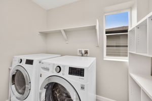 Laundry room with storage upstairs, washer and dryer INCLUDED!