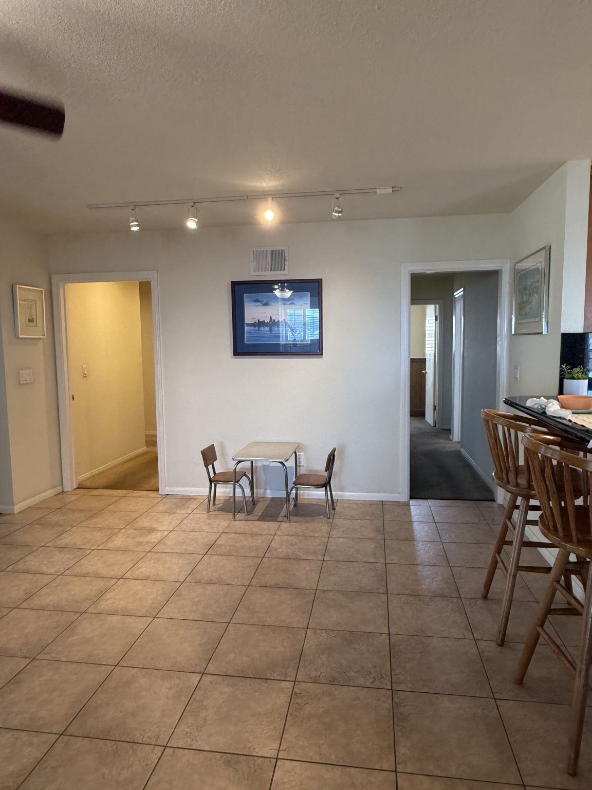 Dining area links kitchen and family rooms