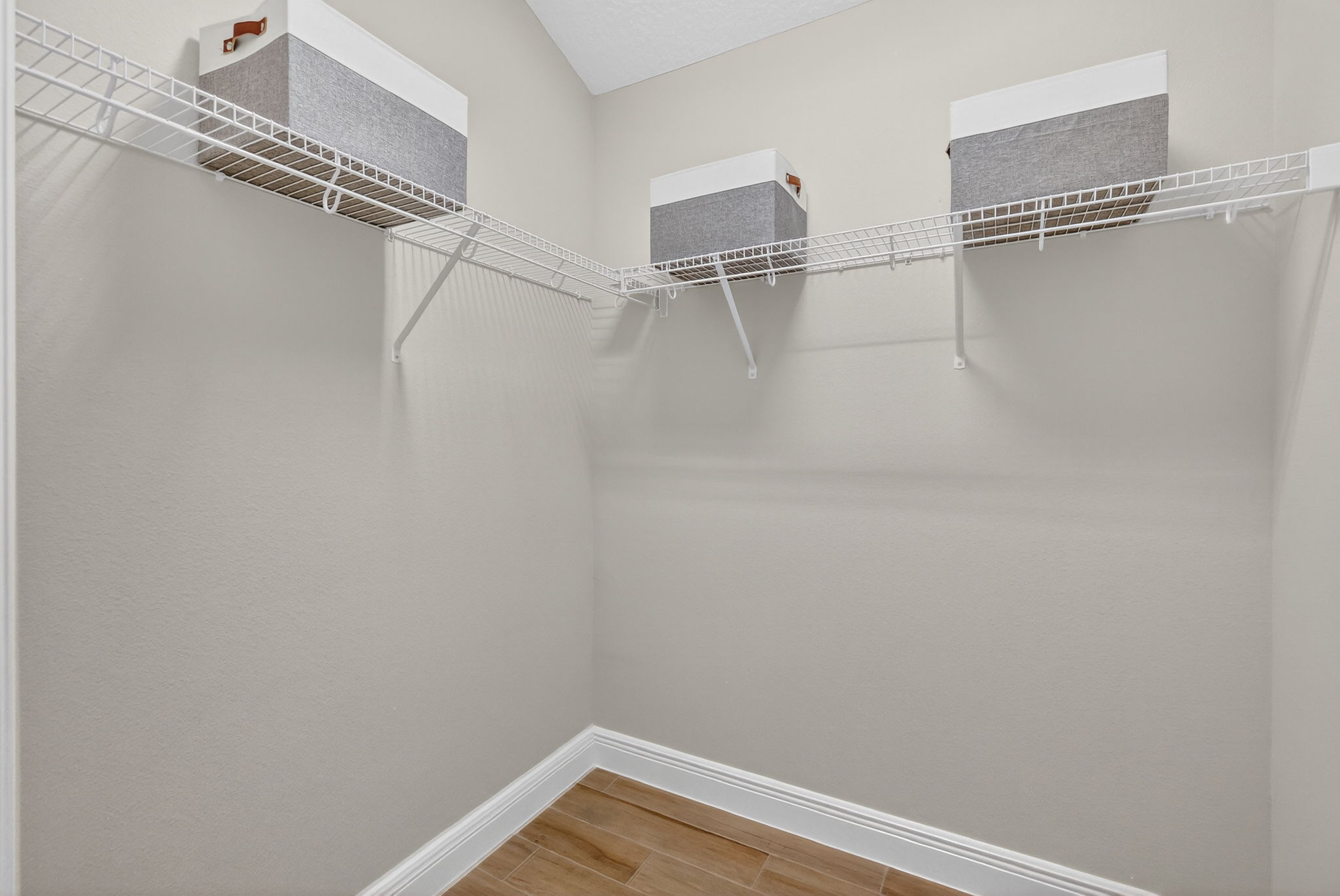 Primary Bedroom First Walk-In Closet