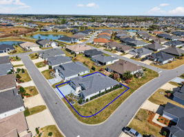 Aerial Side Elevation with Property Lines of Large Corner Lot with Nearby Bissell Walking Trail