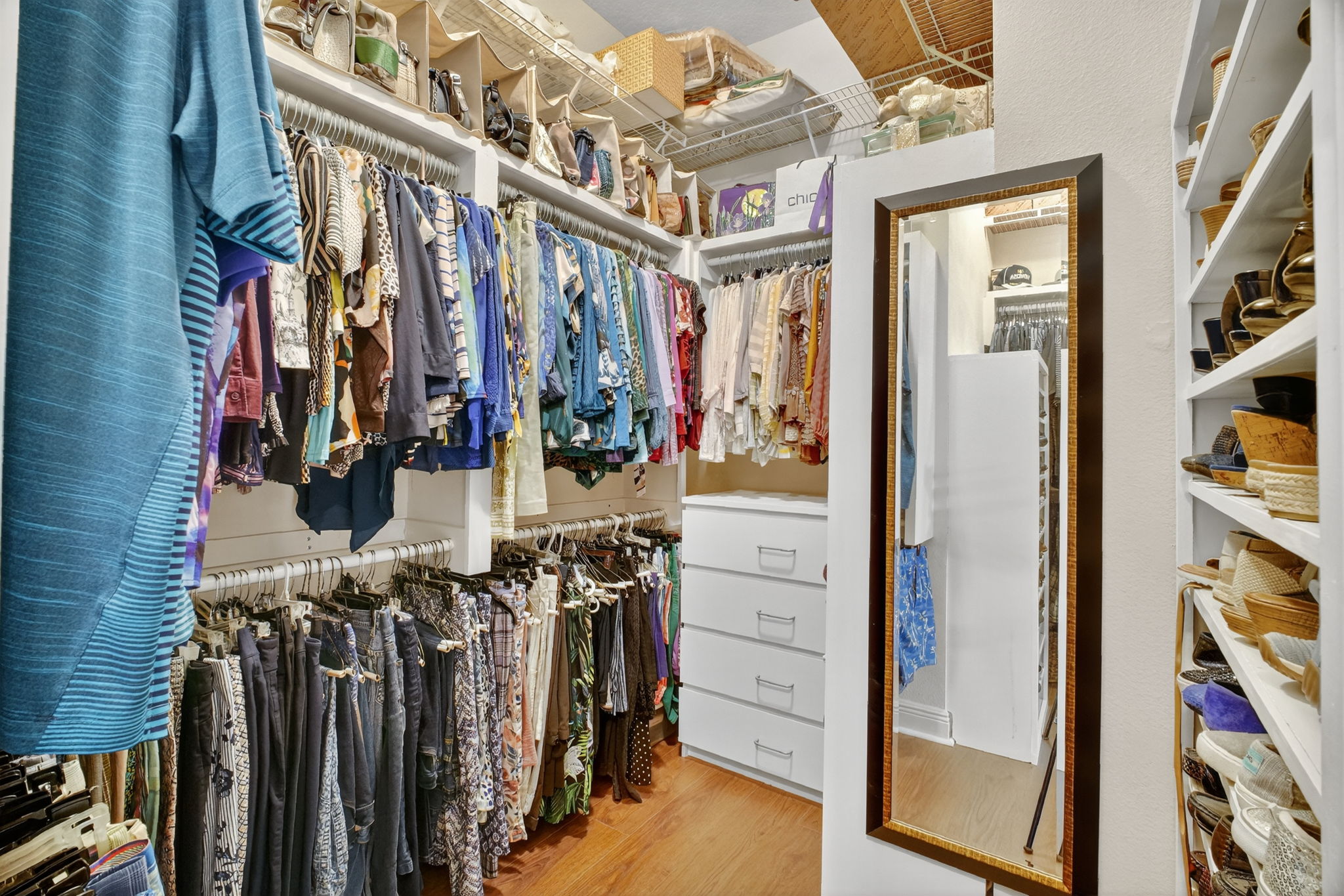 Primary Bedroom Customized Walk-In Closet