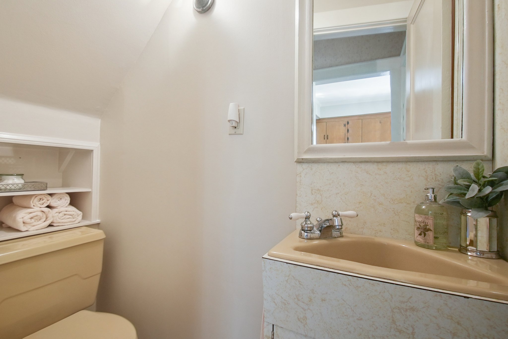 Hideaway full bath under the stairs