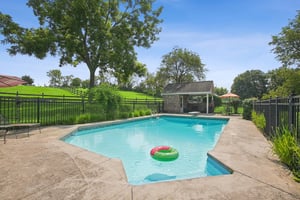 Pool showing pool house