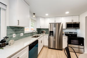 Designer Tile Backsplash & SS Appliances
