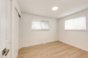 Secondary Bedroom w Double Banks of Closets