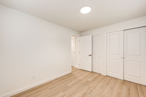 Secondary Bedroom w Double Banks of Closets