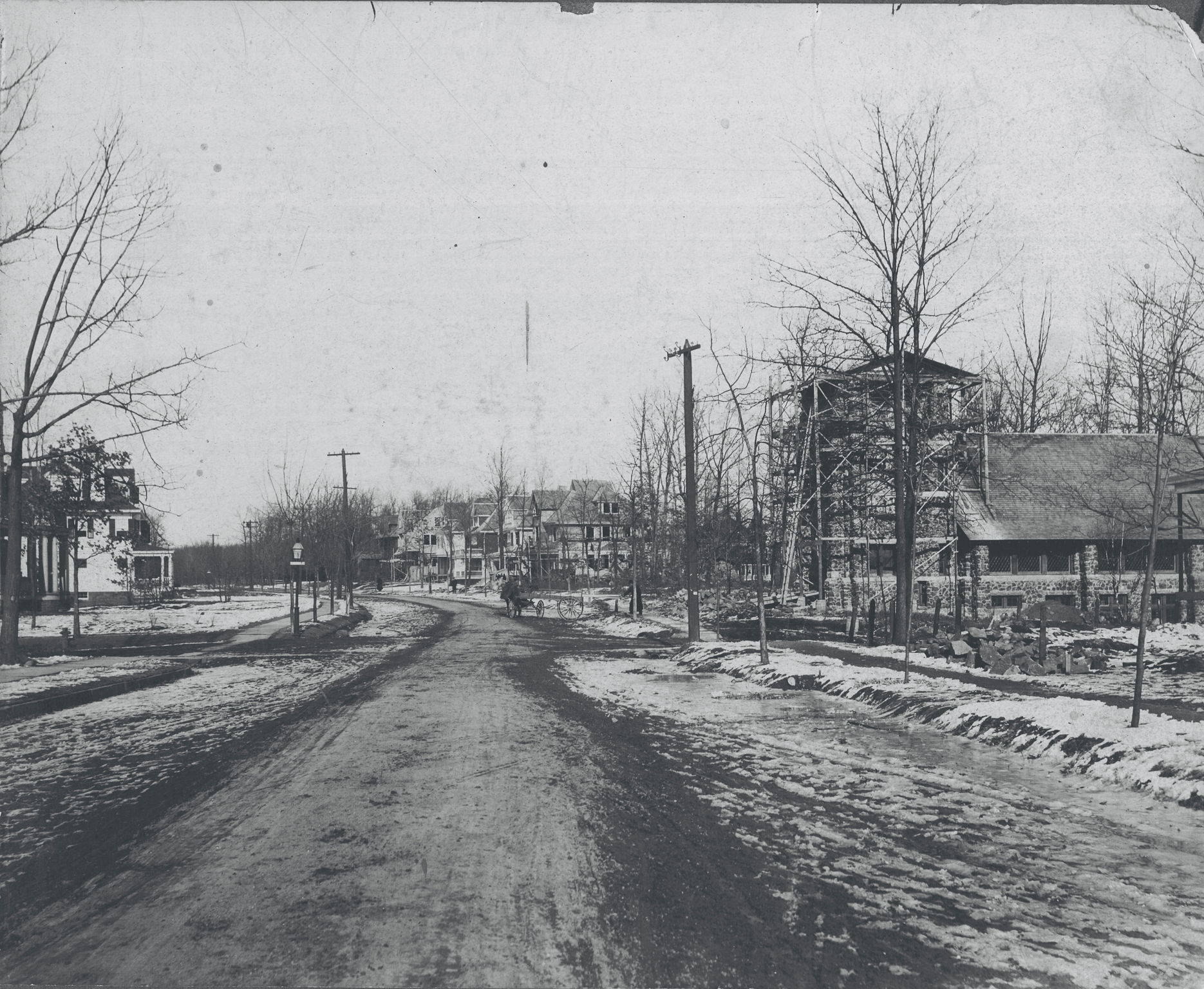 58 Montclair Ave on the left. St John's church across the street was built in 1923.