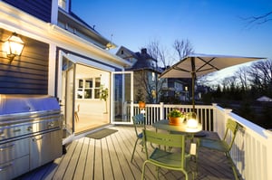 Day or night, the back deck is as practical as it is inviting.