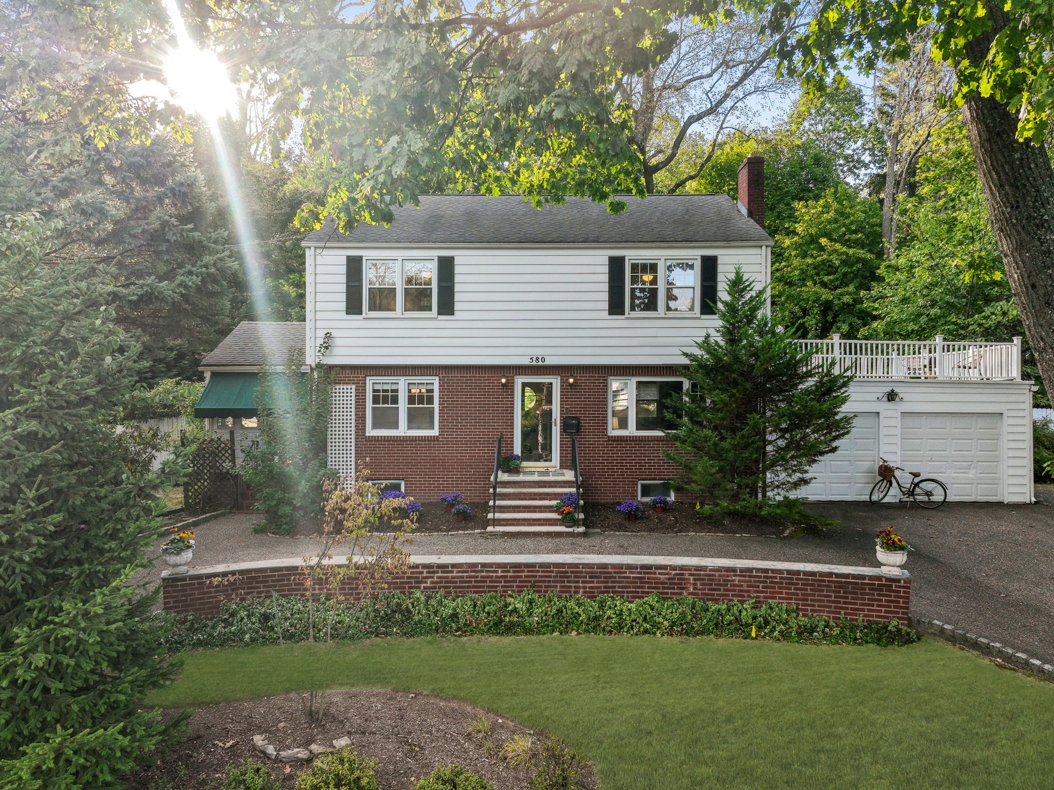 What will be your favorite part of this mid-century charmer? The roof deck for stargazing? The big backyard for gatherings? The three-season room for lazy afternoons? Or the ground-level in-law suite where guests can stretch out?