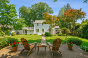 Sometimes the story begins out back - nearly half an acre of serenity where sunlight, memories, and quiet moments all find their place.