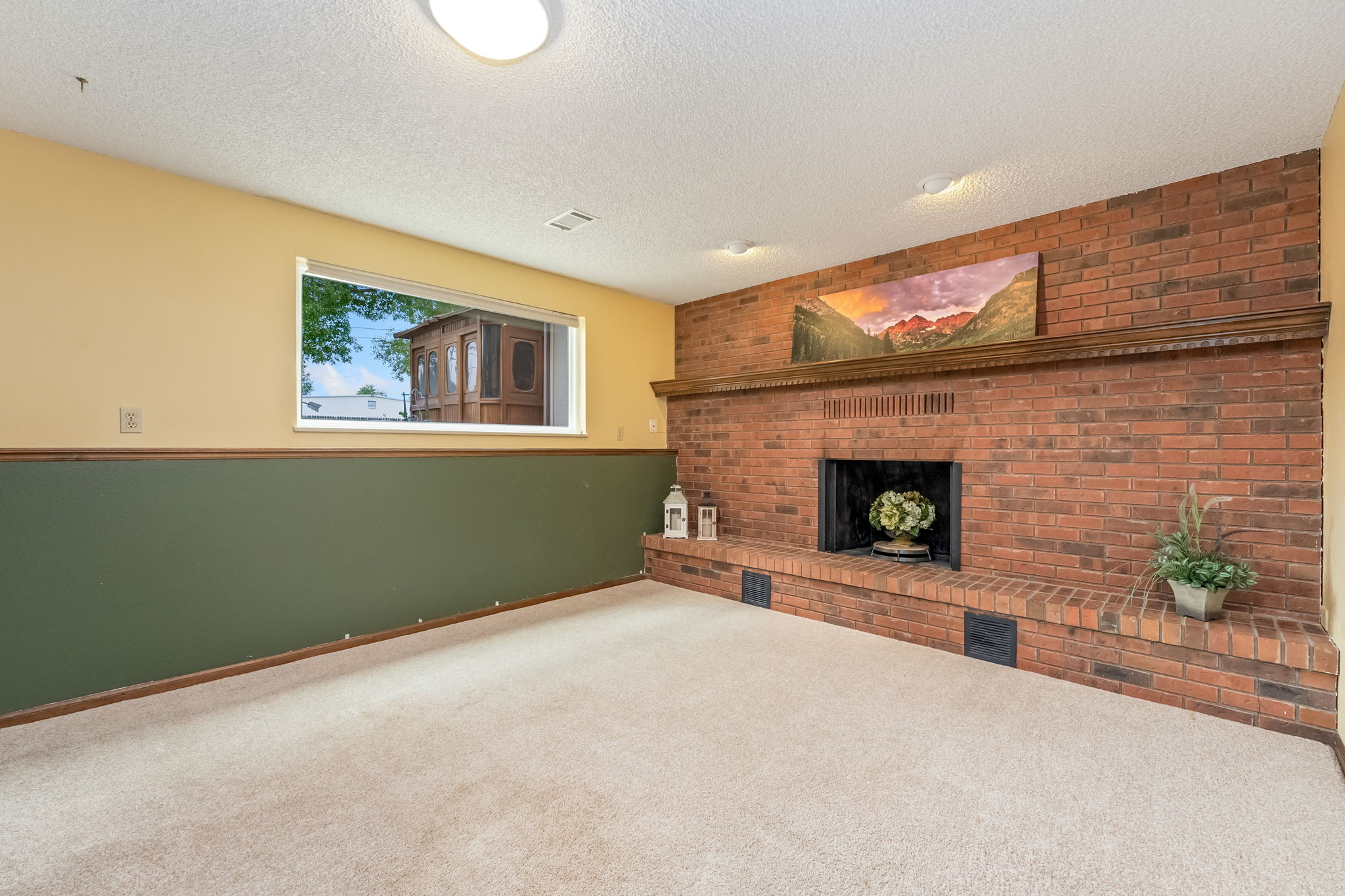 Wood Burning Fireplace and Picture Window for Cozy Nights
