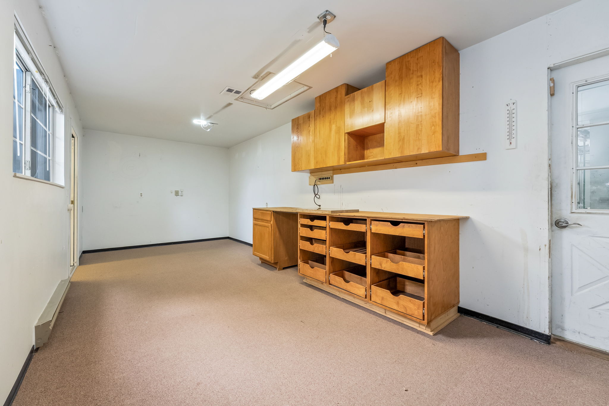 Total of 368 SF Bonus Flex Space!! This is Space #1 behind the Garage. It makes a great Workshop, Home Office, or Hobby Area.