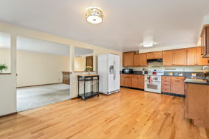 Maple Cabinets have soft-close drawers and pull-outs. Silestone Countertops are functional and beautiful.