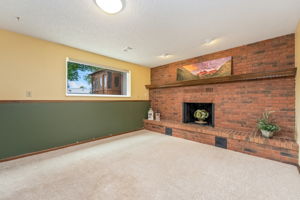 Wood Burning Fireplace and Picture Window for Cozy Nights