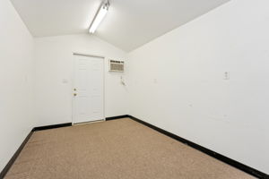 Flex Space #2 is finished and has a door to the Backyard.