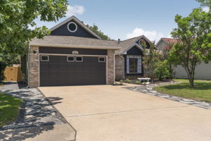 Left side view of low maintenance landscaping