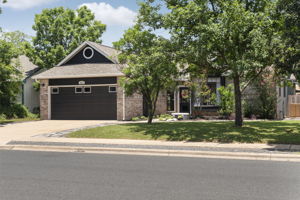 Right side view of the lush landscape and beautiful home.