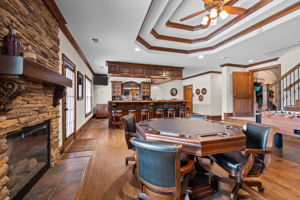 Game room and media room w/stone gas log fireplace